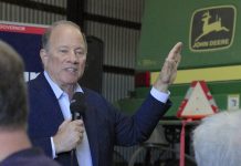 A candidate walks into a barn in West Michigan