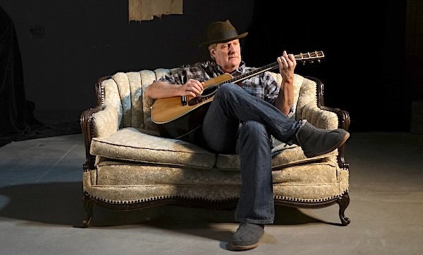 363JEFF DAINEILSjd_couch_pose_w__guitar_photo_by_luc_daniels copy